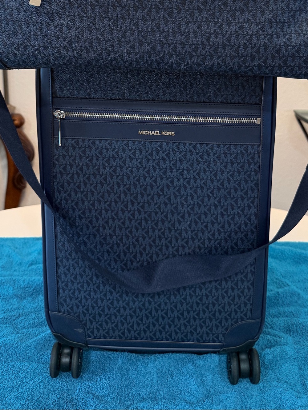 Michael Kors Navy Monogram Spinner luggage bag